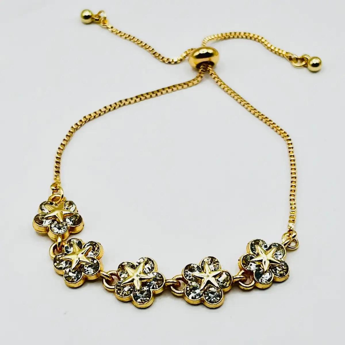 Bracelet fleur doré en acier inoxydable 304 et zirconium AAA